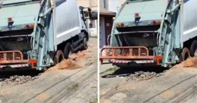 Caminhão afunda em rua no Jardim Panorama em Caçapava após asfalto ceder